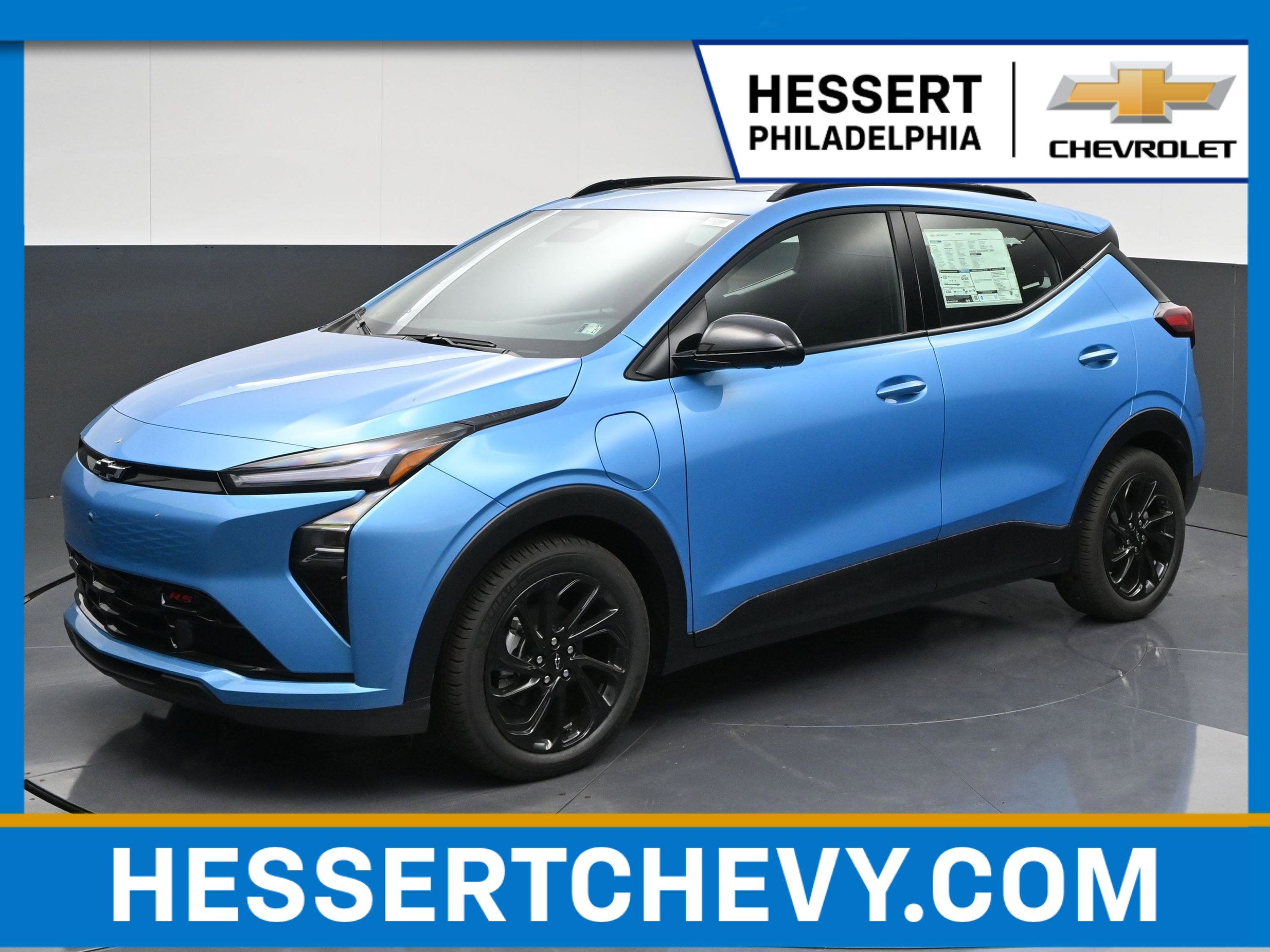 2027 Chevrolet Bolt RS in Marina Blue Metallic — front three-quarter view